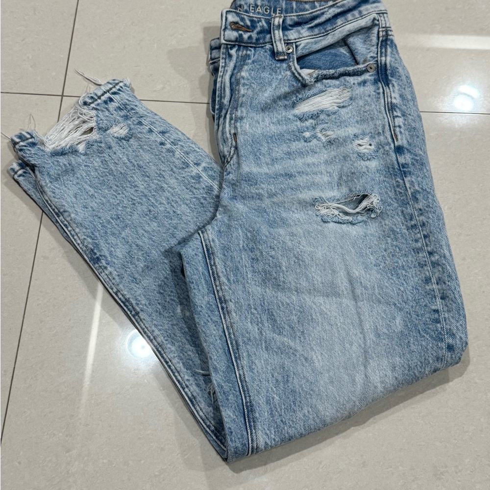 Woman’s Distressed Blue Jeans